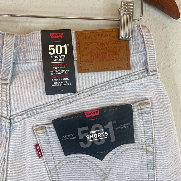 Levi’s 501 Hi Rise Women’s Light Blue Pink Tint Raw Hem Shorts/Sz:28 - Picture 1 of 7